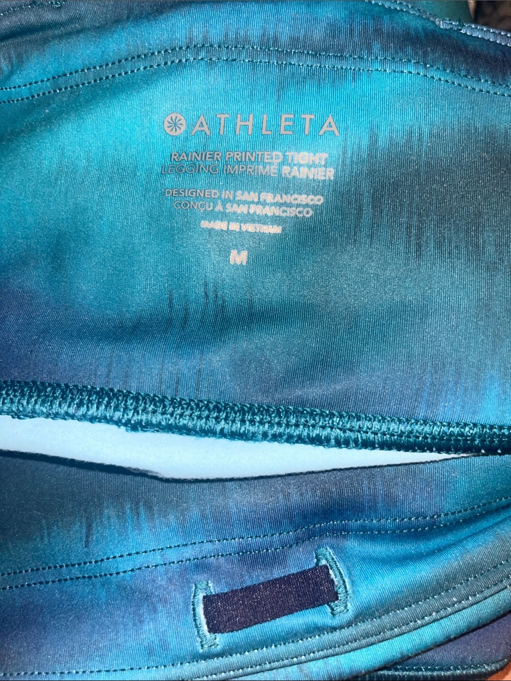 Athleta Rainier Reflective Printed Tight in Blue/Teal Watercolor Swirl - Picture 4 of 7